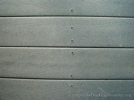 Swelling around screw holes on a composite deck.